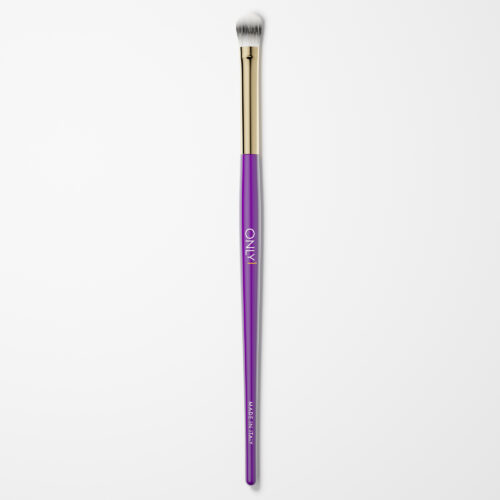 Purple and gold makeup brush with white bristles on a plain white background.