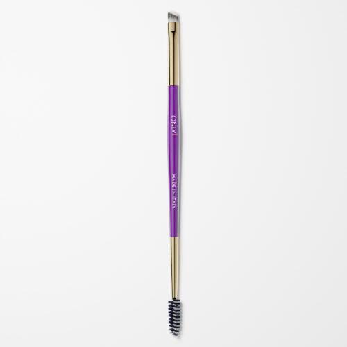 Double-ended eyebrow brush with a purple handle and gold accents, featuring an angled brush on one end and a spoolie on the other, on a plain white background.