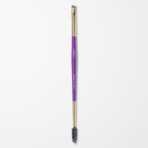 Double-ended eyebrow brush with a purple handle and gold accents, featuring an angled brush on one end and a spoolie on the other, on a plain white background.
