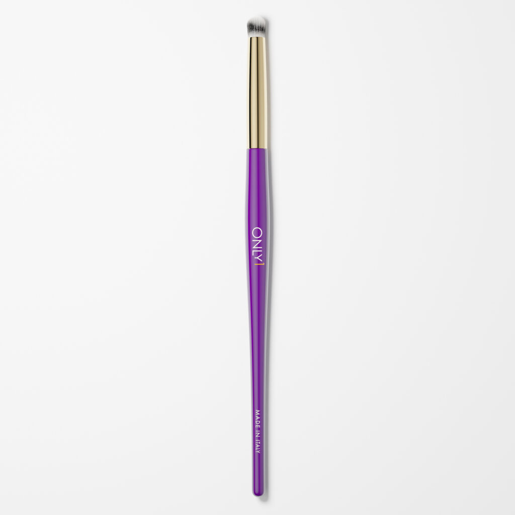 Pencil makeup brush with a purple handle, gold accents, and white bristles on a plain white background.