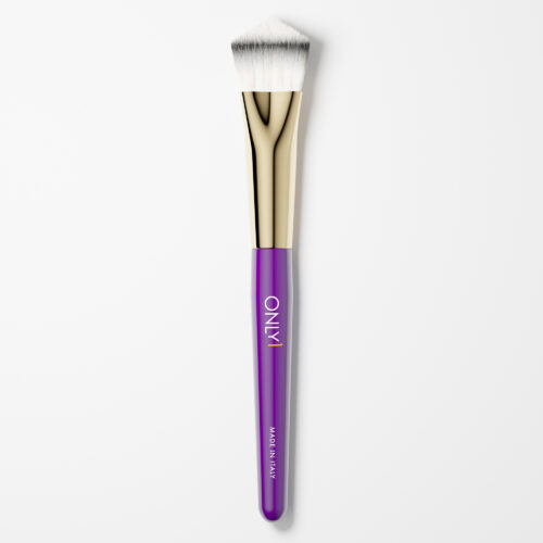 Small foundation brush with a purple handle, gold accents, and dense white bristles on a plain white background.