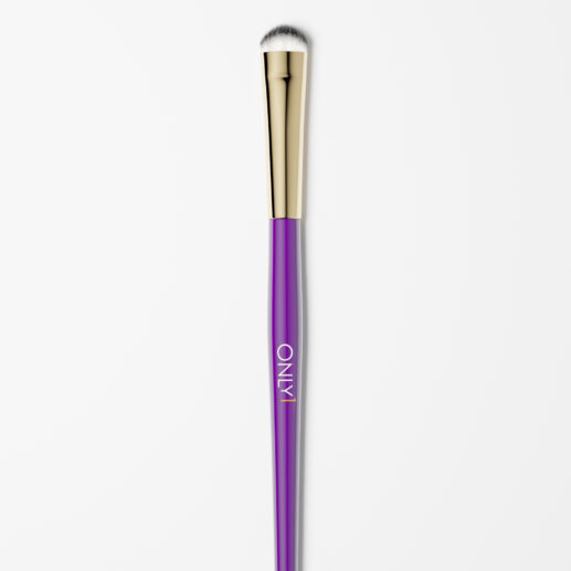 Dense shading brush with a purple handle, gold accents, and white bristles on a plain white background.
