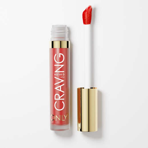 A bonfire colorl liquid lipstick bottle with a red cap sits on a white background. Text on the bottle reads "CRAVING" all caps