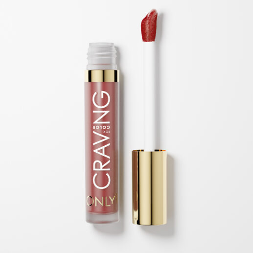 A ruby red color liquid lipstick bottle with a red cap sits on a white background. Text on the bottle reads "CRAVING" all caps