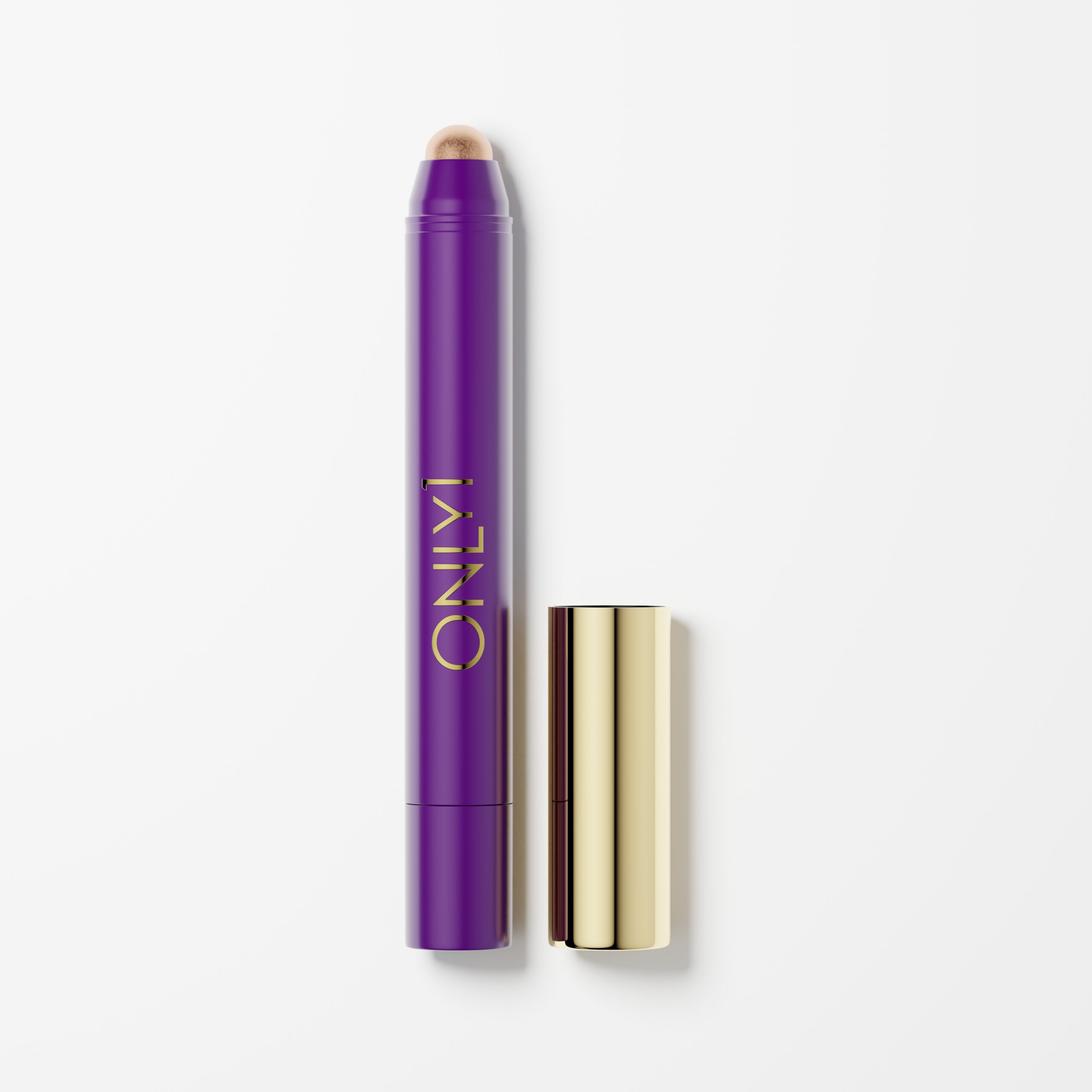 Eyeshadow stick in purple and gold packaging