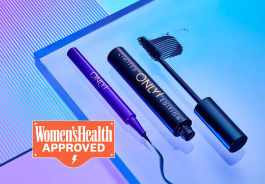 Purple eyeliner and black limited edition mascara on a reflective blue surface with a "Women's Health Approved" badge